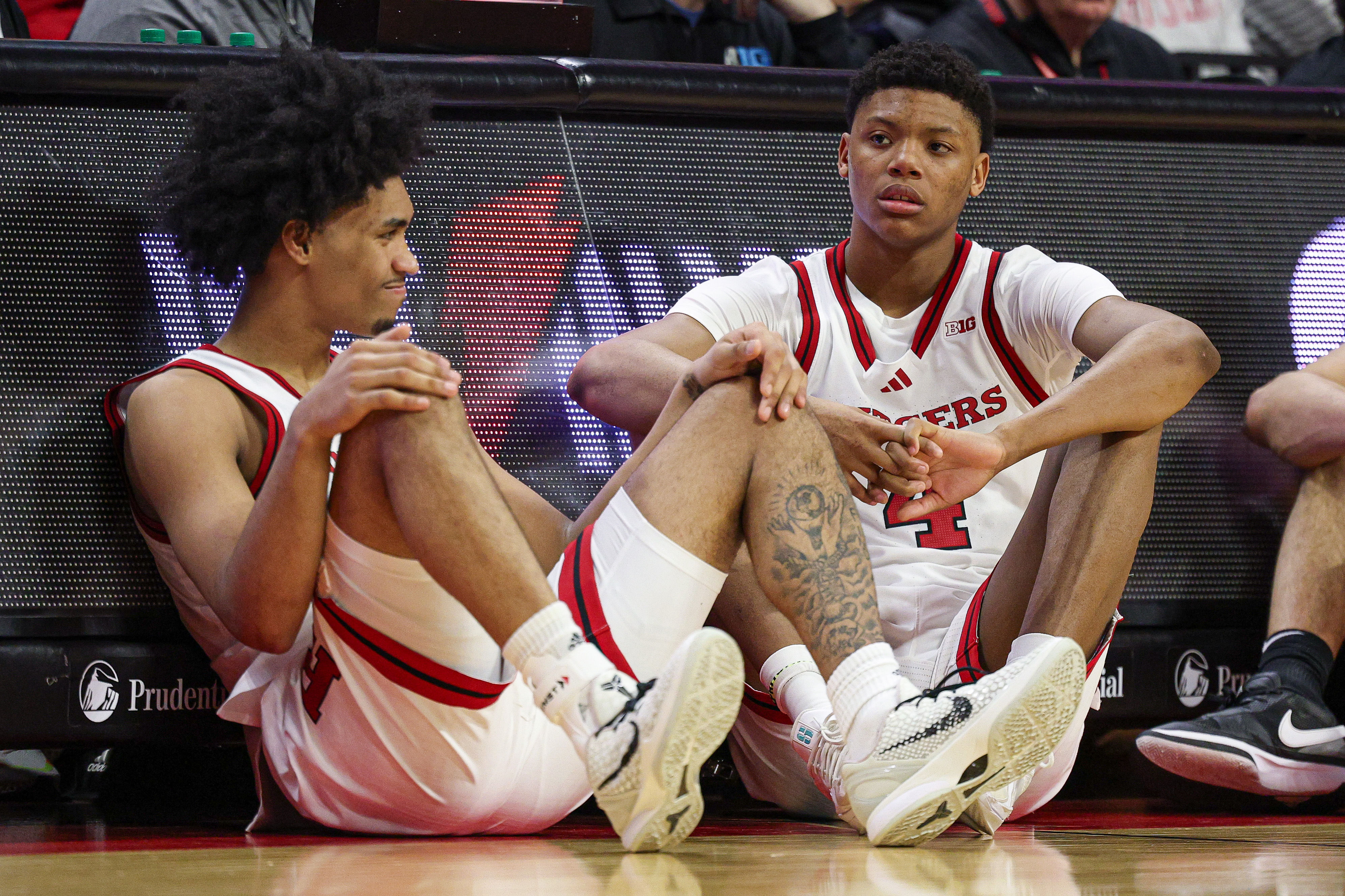 Rutgers players Dylan Harper (#2) and Ace Bailey (4) look on during the second half against Minnesota at Jersey Mike's Arena. Photo: Imagn